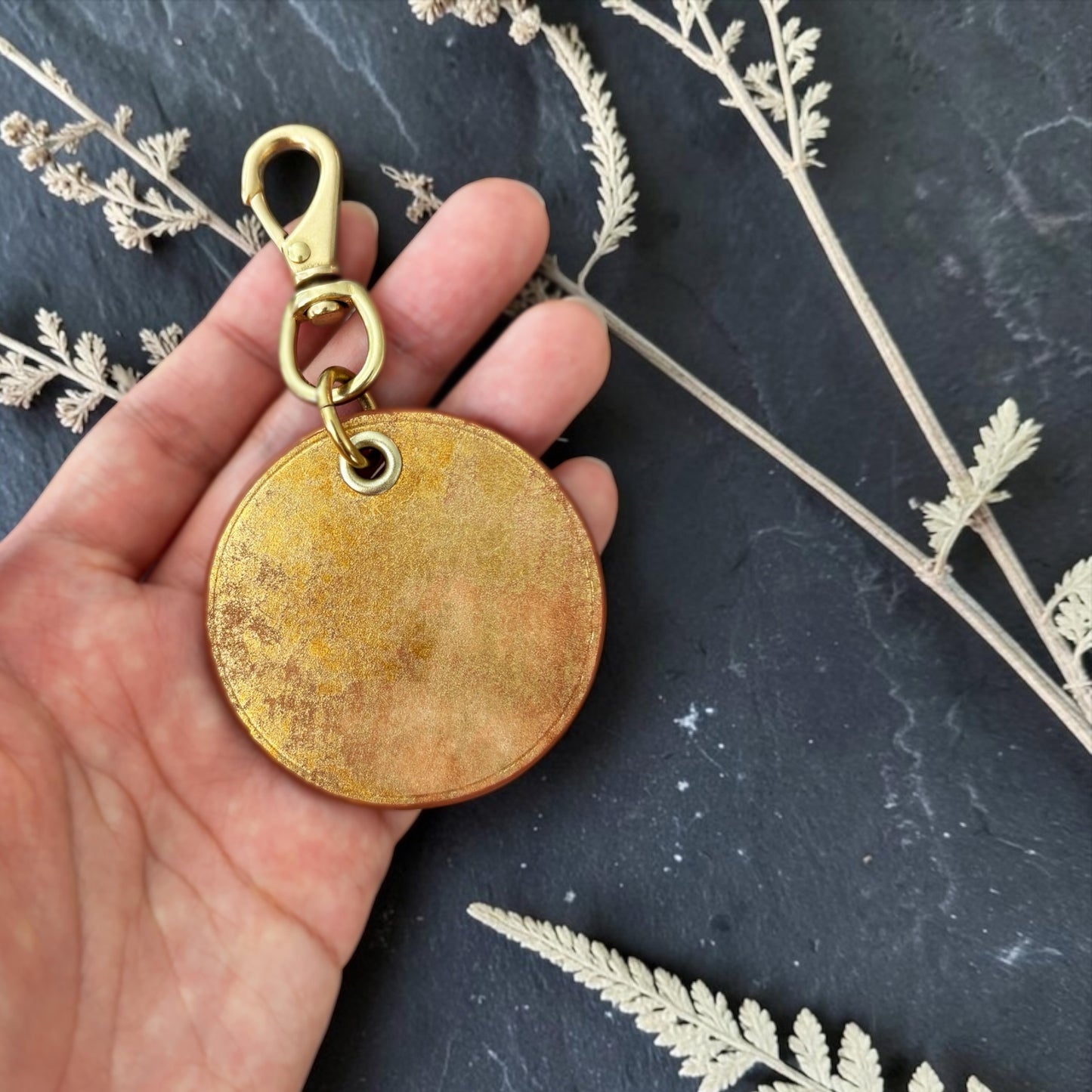 Gold medal charm