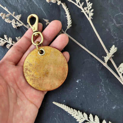 Gold medal charm